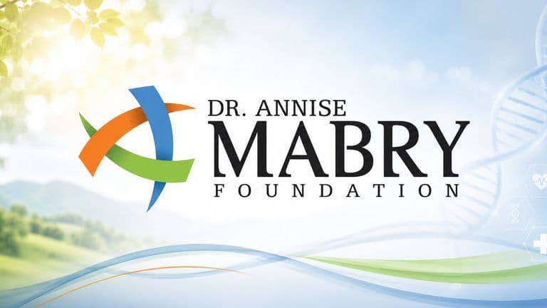 Dr. Annise Mabry Foundation logo with abstract ribbon design, DNA graphic, and healthcare-themed background.