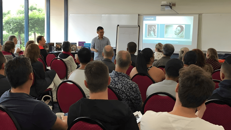 Andrew Low leading a coaching seminar on burnout recovery and career transformation through Neurowisdom™.