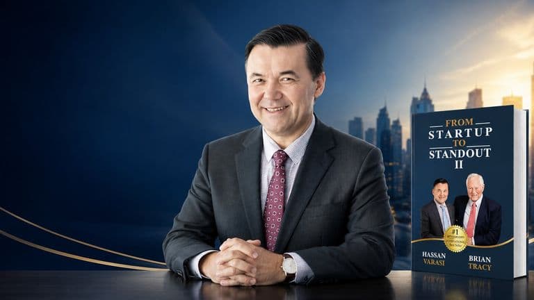 Professional portrait of Dr. Hassan Varasi beside his bestselling business book, with a modern city skyline background.