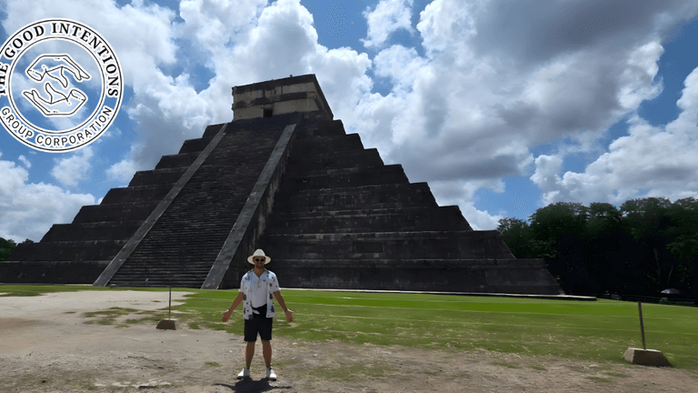 Mike Lucyk of The Good Intentions Group stands in front of a pyramid, promoting nervous system education and wellness.