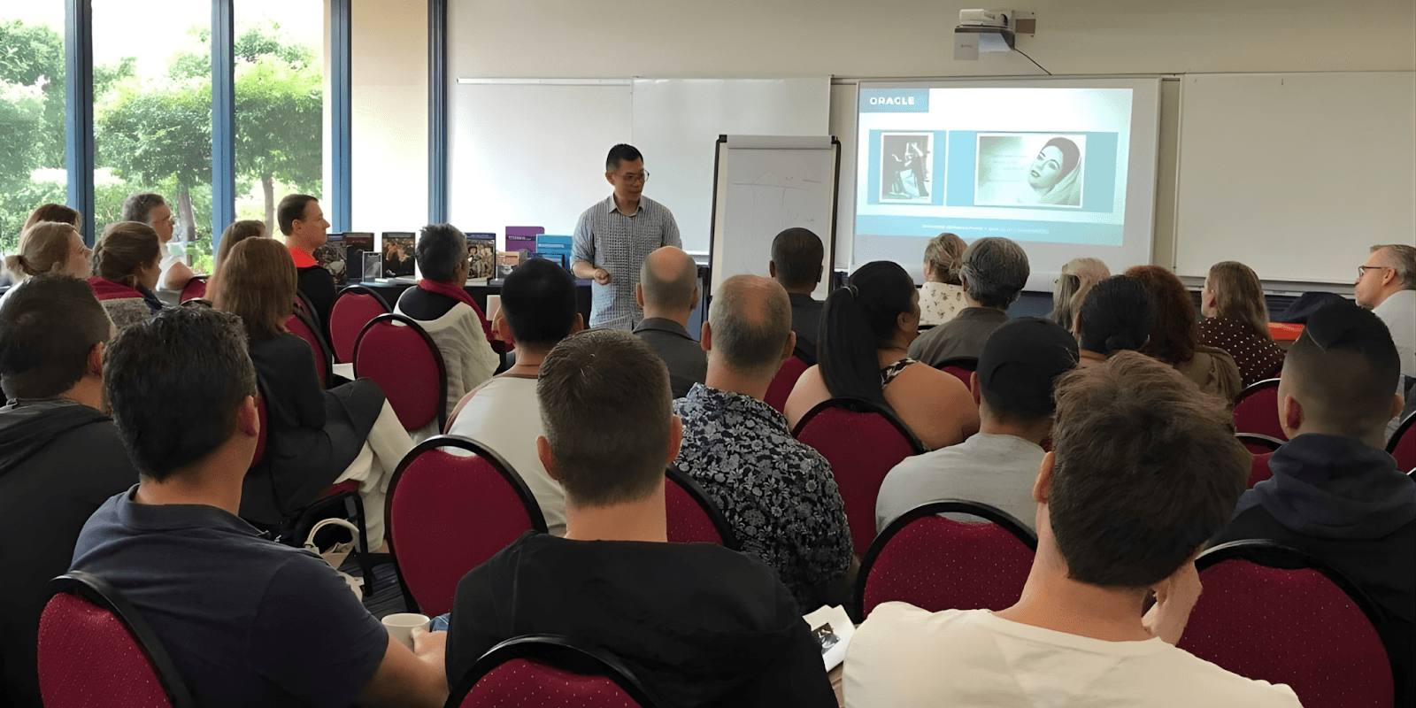 Andrew Low leading a coaching seminar on burnout recovery and career transformation through Neurowisdom™.