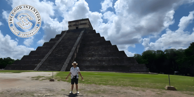 Mike Lucyk of The Good Intentions Group stands in front of a pyramid, promoting nervous system education and wellness.