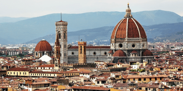 Florence's skyline featuring the iconic Florence Cathedral and surrounding rooftops.