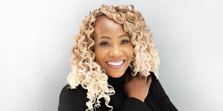 Dr. Trina R. Wilson Launches ‘Aligned and Abundant’ Journal to Support Entrepreneurial Growth Dr. Trina R. Wilson, smiling confidently in black attire, launches the 'Aligned and Abundant' journal for entrepreneurs.